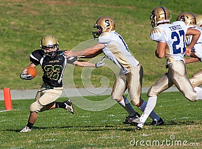 American Football Player Running with the Ball During a Game