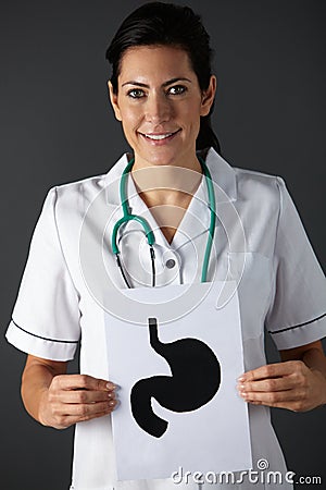 American nurse holding ink drawing of stomach