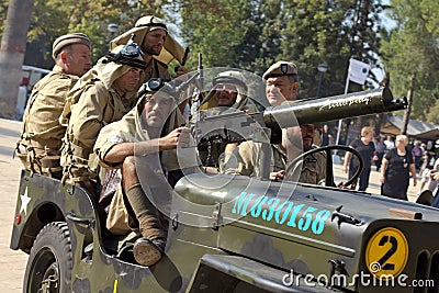 American soldiers on a military car