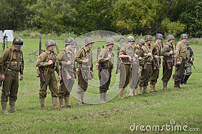 American troop in historical reenactment of WWII