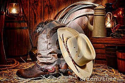 American West Rodeo Cowboy Hat and Boots in a Barn