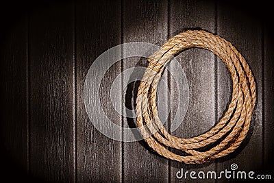 American West Rodeo Rope on Old Rustic Barn Wall
