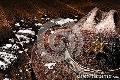 American West Sheriff Badge on Hat and Winter Snow