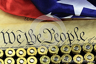 Ammunition and flag on US Constitution - History of the Second Amendment