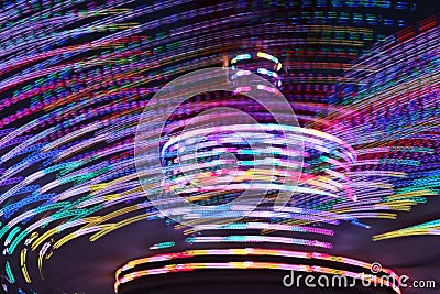 Amusement park spinning lights