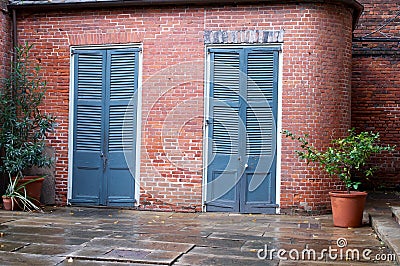 Ancient Blue door in a Brick Wall