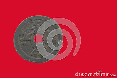 Ancient Chinese coin with Red Background