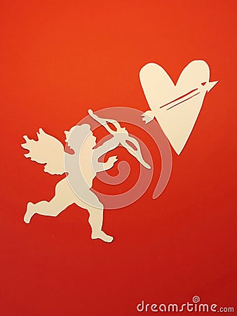 Angel and heart. Paper cutting.