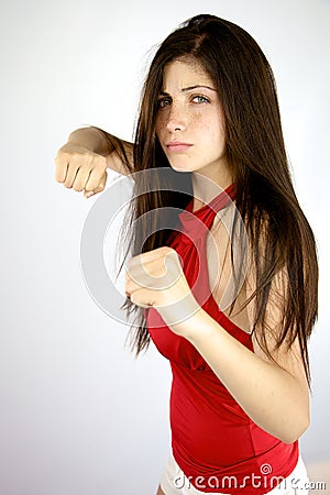Angry beautiful girl ready to punch and get what she wants