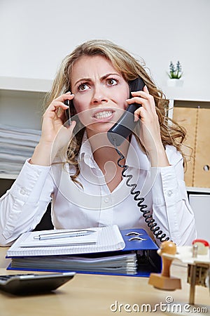 Angry business woman on the phone