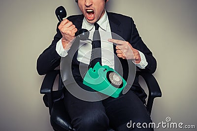 Angry businessman on the phone