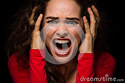 Angry, desperate woman screaming