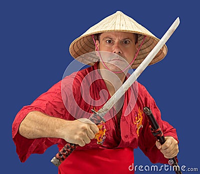 Angry man holding samurai sword