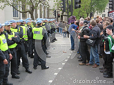 Anti Fascists square up against police during the BNP during a