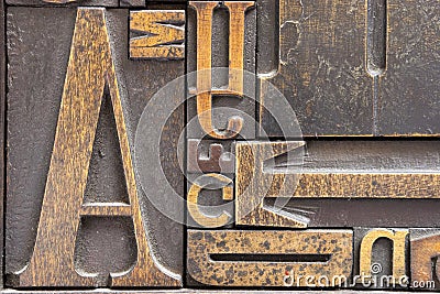 Antique printing block letters