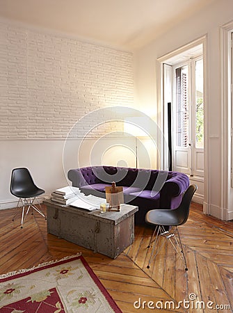 Apartment interior with white brick wall and window