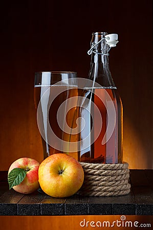 Apple cider glass and bottle