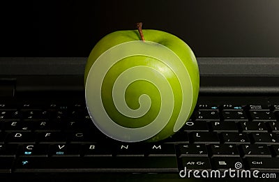 Apple on a laptop