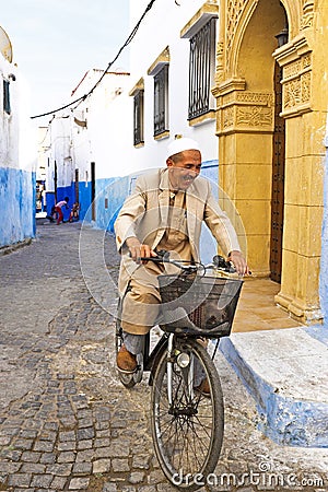 Arab man is biking in Rabat Morocco
