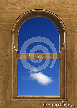 Arch shaped wood window frame with white cloud in blue sky