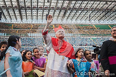 Archbishop Scola waves 50.000 teenagers at San Siro stadium in Milan, Italy