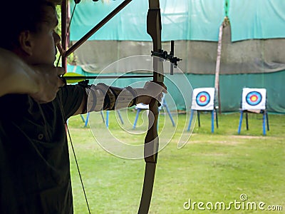 Archer takes aim at a target