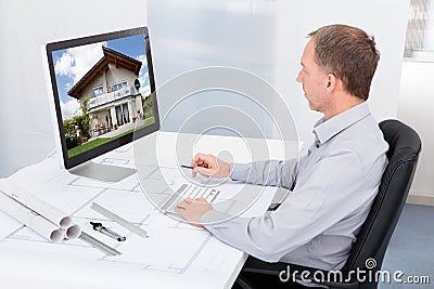 Architect working on computer