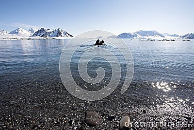 Arctic landscape - people in the boat