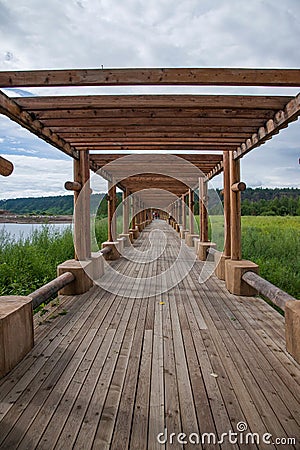 Arctic river sandbar log promenade Mohe Arctic Village