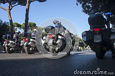 Array of Italian policeman in motorcycle (municipal police)