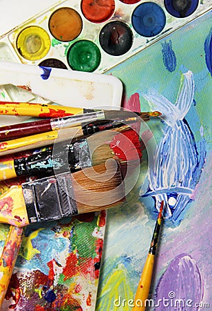 Art palette, picture and mix of paintbrushes