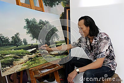 The artist is drawing landscape