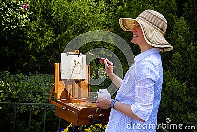 Artist painting landscape