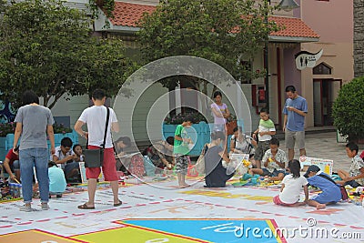 Asia，china，Shenzhen，Children s toys exchange activities in Happy Valley square