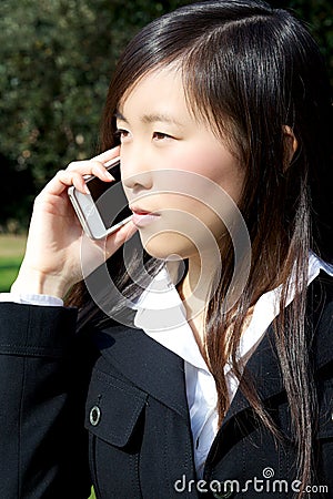 Asian american business woman on the phone