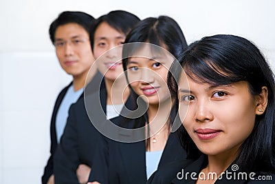 Asian business people line up