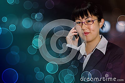 Asian business woman with mobile phone