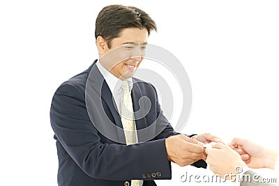 Asian businessman exchanging business cards
