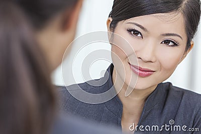 Asian Chinese Woman or Businesswoman in Meeting