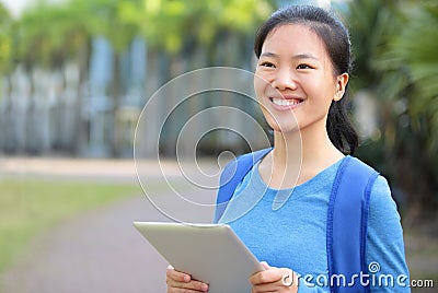 Asian college student with digital tablet