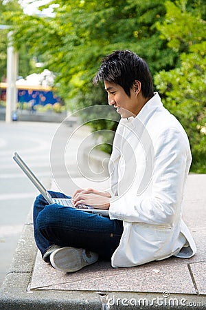Asian college student and laptop