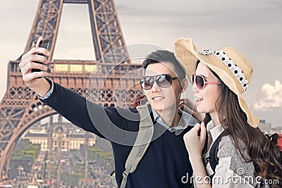 Asian couple travel and take a selfie