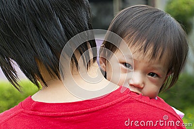 Asian Family in mother s arms