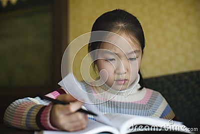 Asian girl studying