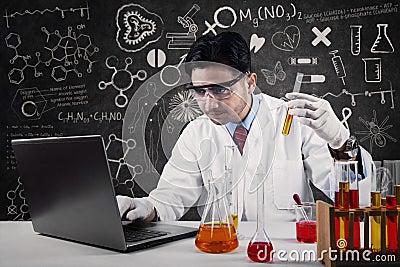 Asian scientist working in laboratory