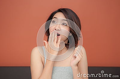 Asian woman doing surprised face