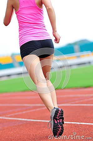Asian woman runner running
