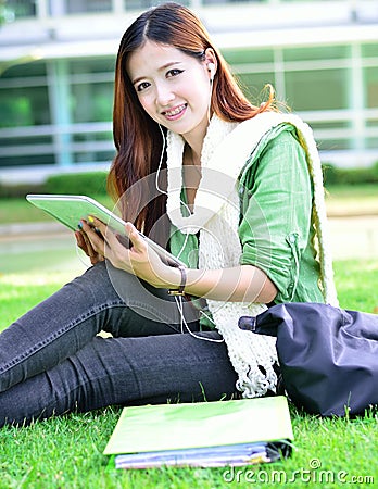 Asian women student learning with computer tablet