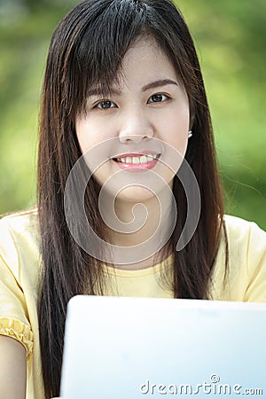 Asian young girl use laptop for search information