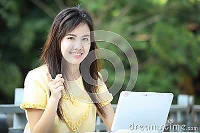 Asian young girl use laptop for search information